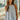 SLEEVELESS RUFFLE HEM TANK TOP