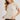 SHORT SLEEVED KNIT SWEATER