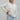 SLOUCHY HENLEY SWEATER