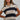 STRIPED SLEEVELESS SWEATER