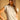 SLEEVELESS COLLARED POLO SWEATER